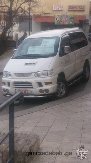 gTavazobT momsaxurebas maRali gamavlobis 7 adgiliani avtomobiliT - Mitsubishi Delica.4x4