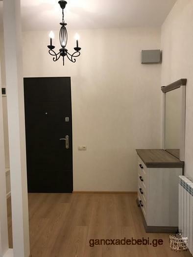 A newly refurbished two-room apartment is available for rent in a newly constructed apartment block.