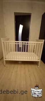 Used wooden baby bed "Chicco" for sale